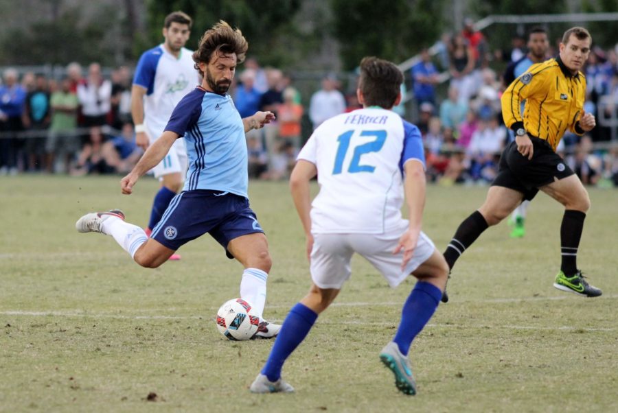 New York City FC midfielder Andrea Pirlo sends the ball across the field during Sunday evenings friendly between FGCU and NYCFC following the MLS clubs week at FGCU for training camp. (EN Photo / Kelli Krebs)