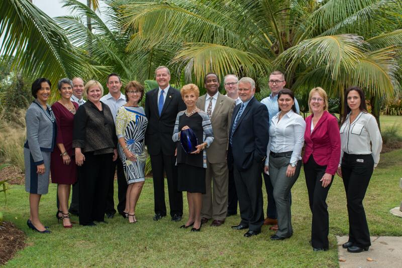 Members of JWOI, FGCU President Wilson Bradshaw, and other distinguished members pose for a group photo at the Paragon Award Ceremony. FGCU student and JWOI mentor Elizabeth O’Dell was also present to get recognition for the work done in service of youth in Collier County. (Photo courtesy of Alisa Coccari)