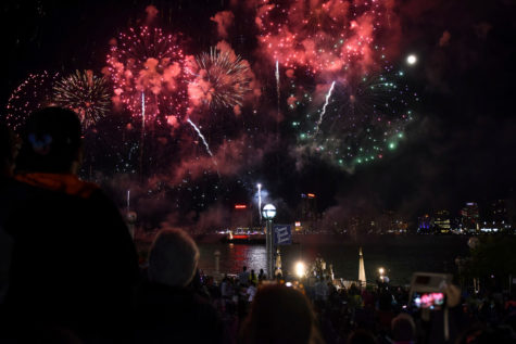 More than 100,000 explosives light up the sky in downtown Detroits Hart Plaza over the Detroit River during the 60th annual Detroit Ford Fireworks Monday, June 25, 2018. (Tanya Moutzalias/Ann Arbor News via AP)
