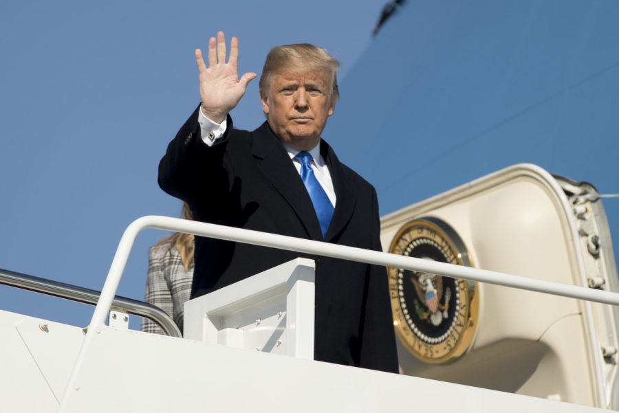 President Donald Trump waves as he boards Air Force One at Andrews Air Force Base, Md., Tuesday, Oct. 30, 2018, to travel to Pittsburgh following last weekends shooting at Tree of Life Synagogue. (AP Photo/Andrew Harnik)