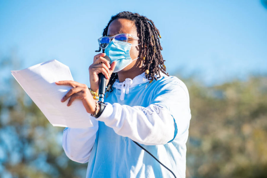 A speaker takes the stage at the BSA Demonstration. EN photo by Julia Bonavita.