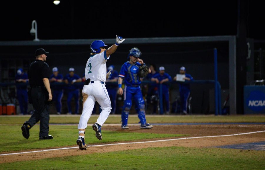 Infielder+Edrick+Felix+%282%29+on+his+way+to+home+plate+after+hitting+a+home+run.+FGCU+baseball+played+UMass+Lowell+on+Friday+Feb.+24%2C+2023+and+won+the+game+8-2.+