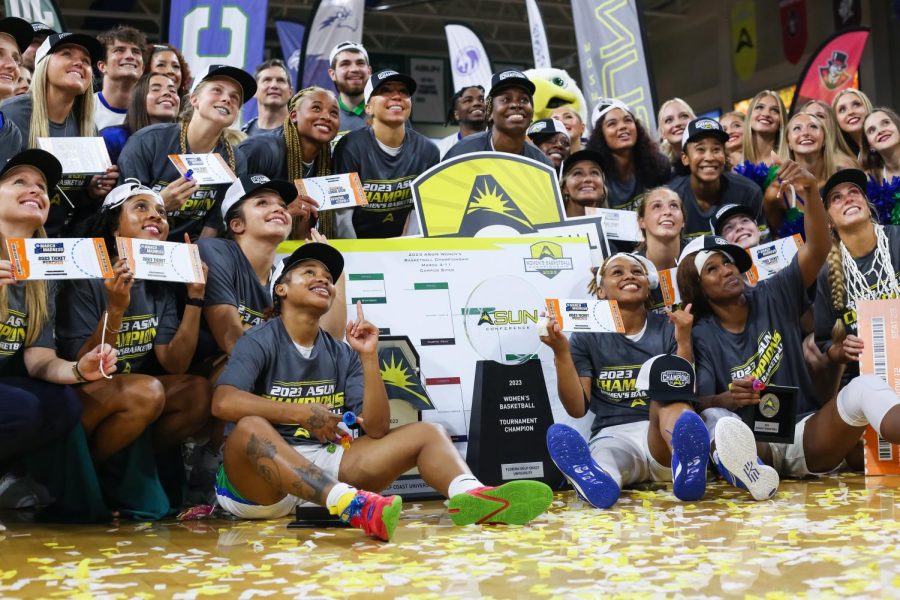 FGCU womens basketball team poses with the ASUN Tournament trophy after their win against Liberty in the final round of the ASUN tournament. The Eagles won their tenth ASUN Championship title on Saturday, March 11, 2023.  