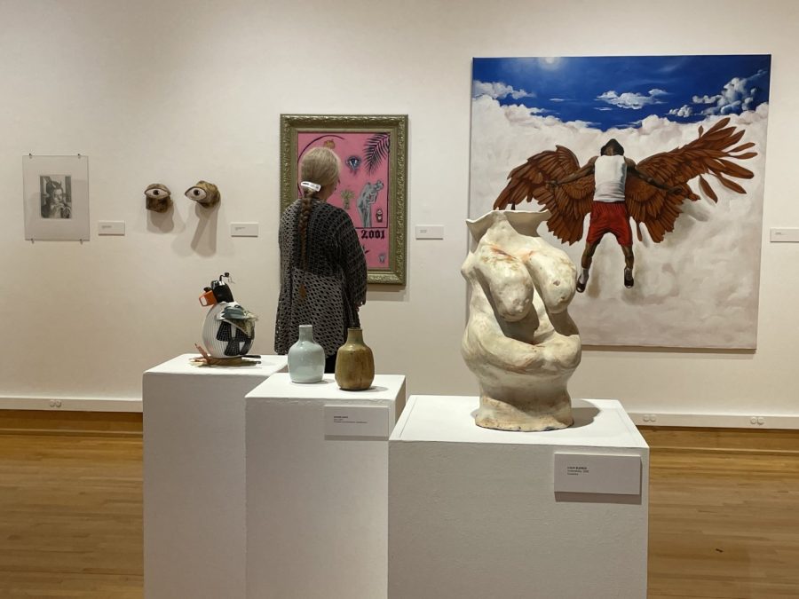 Guests viewed the 25th Annual Juried Student Art Exhibition at the opening reception on March 23.