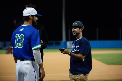 Eagle Media Sports Director, Nick Asselin, interviews FGCU baseball player Brian Ellis after he broke the national record for most consecutive games on base. 