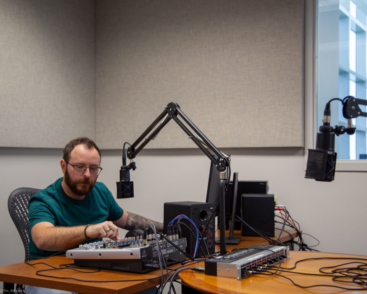 Matt Losey using the audio technology in the new Audio Production Studio.