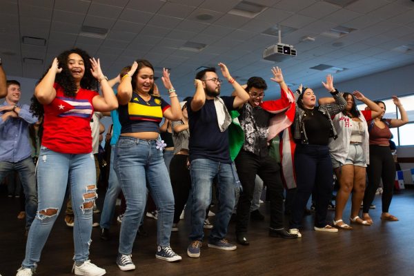 Students filled the dance floor for the Macarena during Noche de Culture September 14, 2023. Photo by