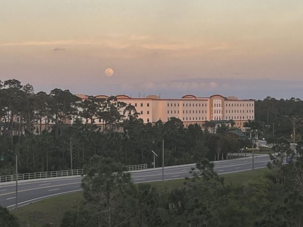 The full moon rises above South Village. Photo by Kevin Rollins. 